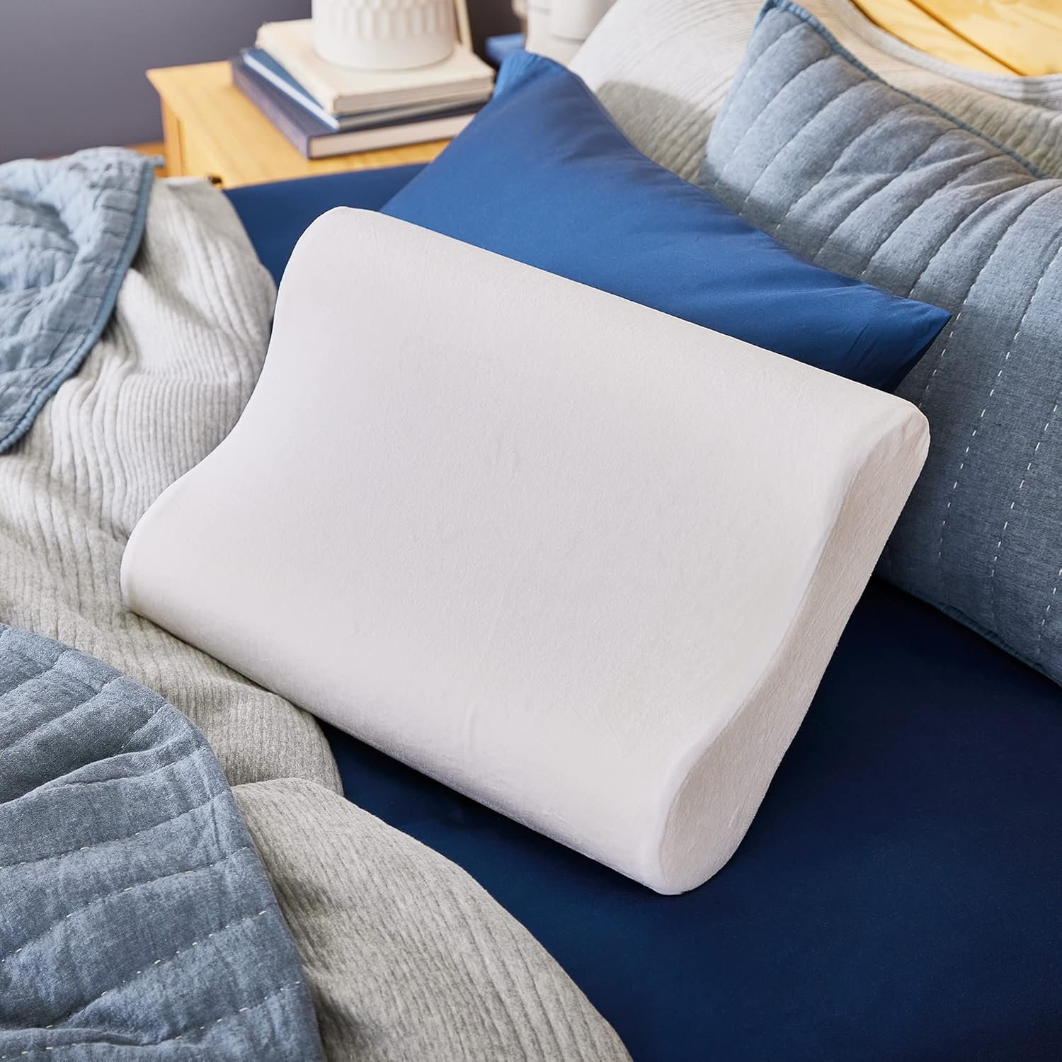 Sleep Innovations Contour Pillow shown from above with dual-height curved design